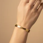 Gold Plated Crossover Engraved Bangle | Trendy Jewel | Anti-Tarnish Jewellery for Women | Minimal High-Polish Design