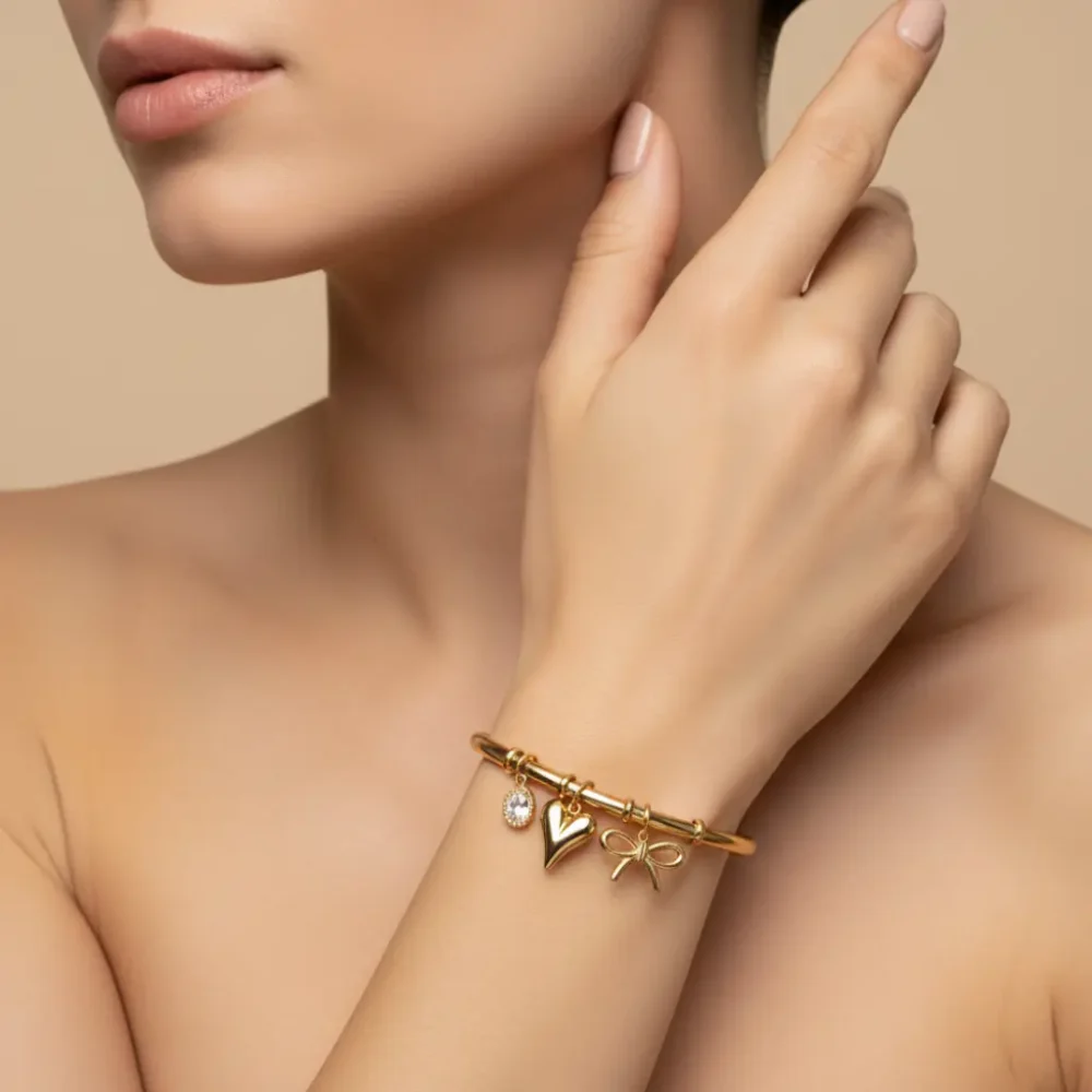 gold-charm-bangle-heart-bow